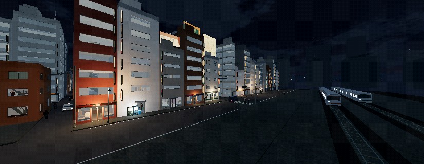 Uraroji at night, trains running beside the street